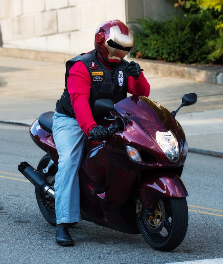 motorcyclist with an iron man helmet