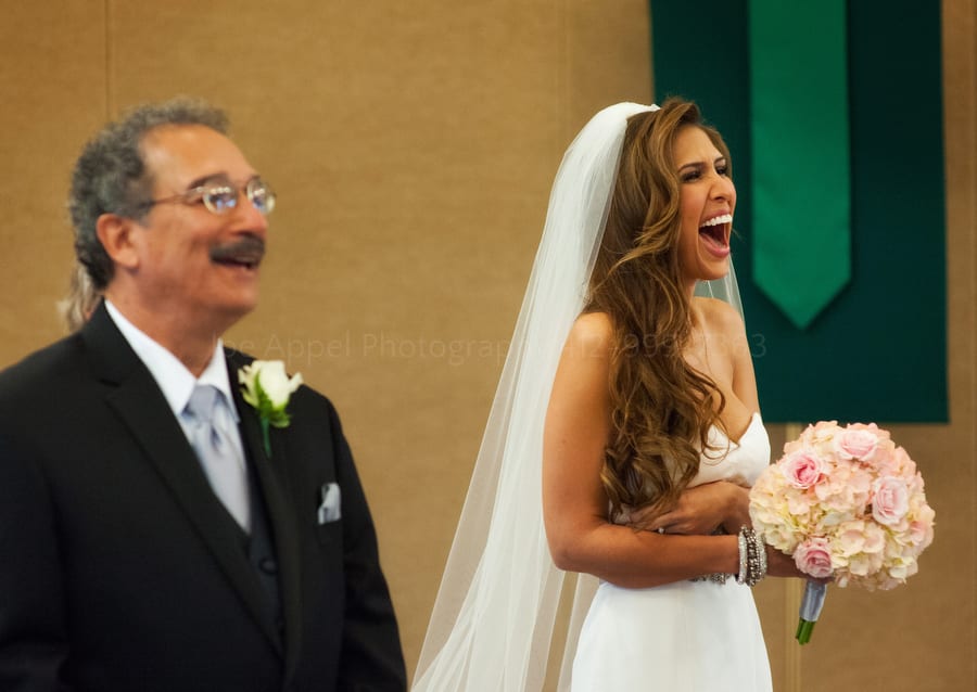 a bride shares a laugh with her father before her wedding near Pittsburgh