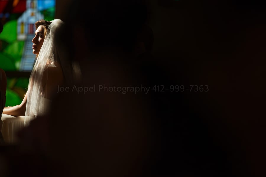 a bride is lit by sunlight during a wedding near Pittsburgh