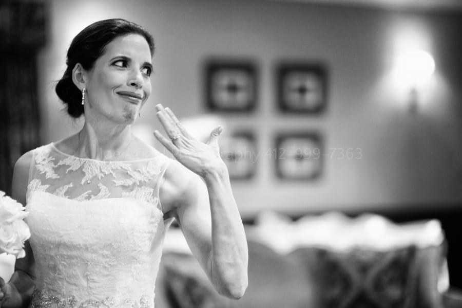 a bride fights back tears before her wedding at Longue Vue Club