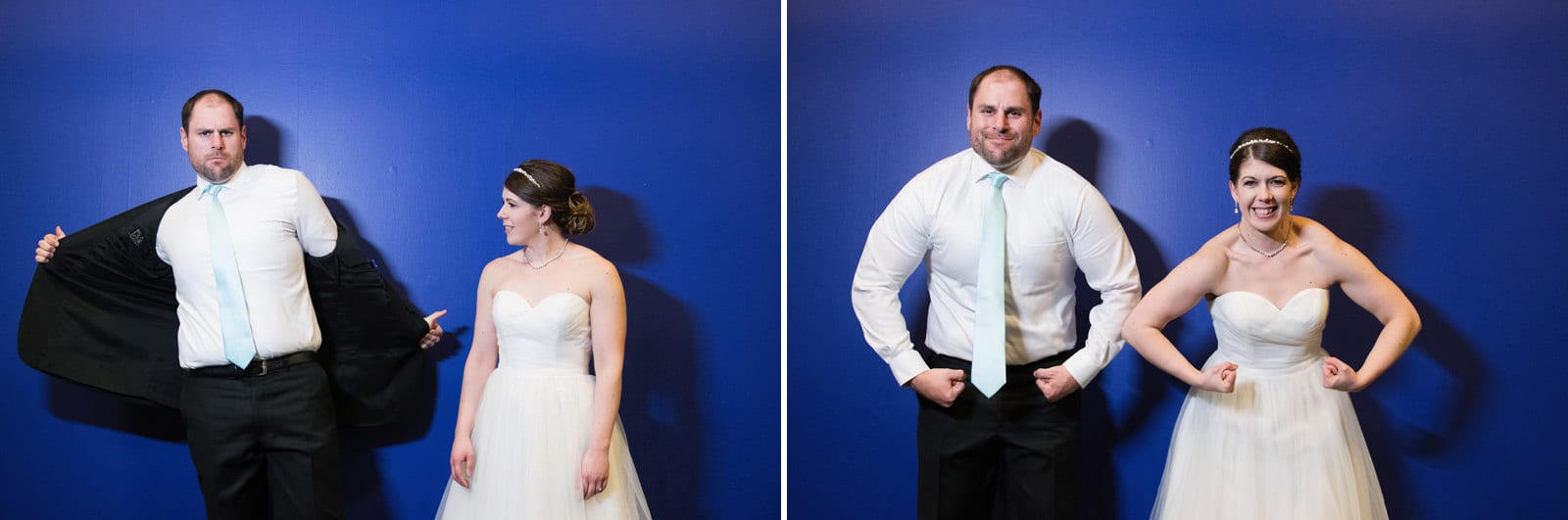 A bride and groom make muscles and funny faces in front of a blue wall before their Children's Museum Pittsburgh Wedding.