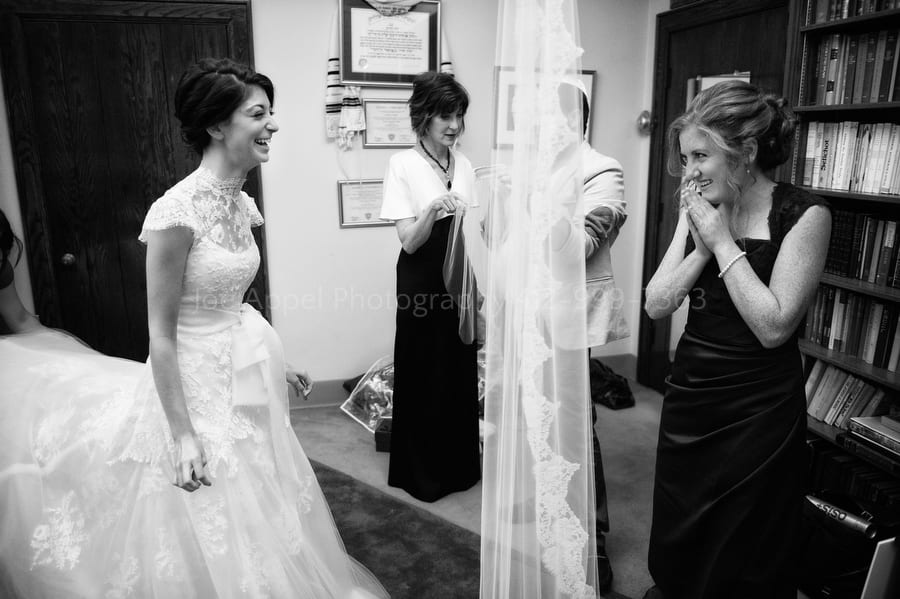 a bridesmaid tears up when seeing her friend in her bridal gown West Virginia Wedding Photography
