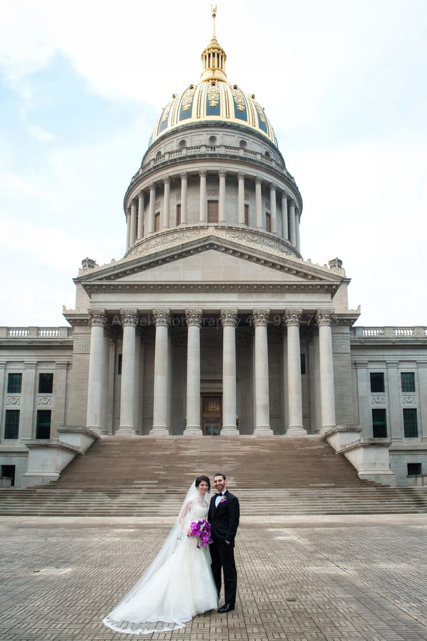 bride and groom in front of the West Virginia State Capital West Virginia Wedding Photography