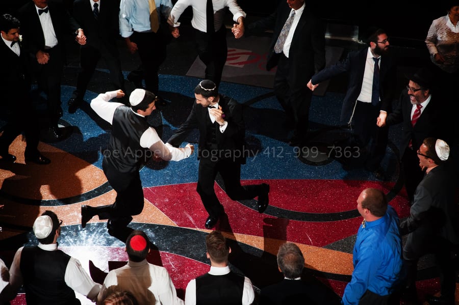 groom dances with men during the hora West Virginia Wedding Photography