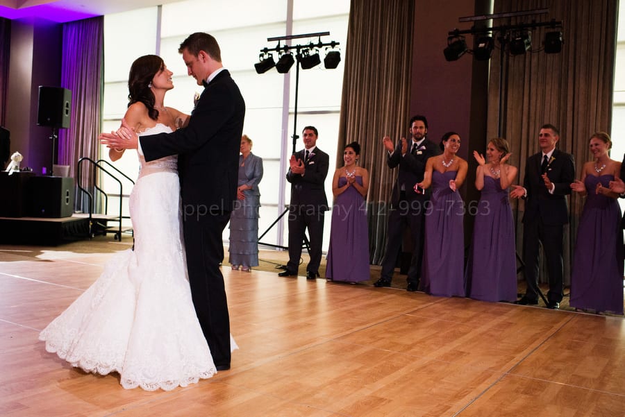 fairmont pittsburgh wedding bride and groom share a first dance at the Fairmont Pittsburgh hotel ballroom
