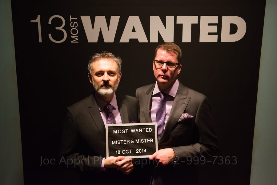Two grooms stand in for a most wanted mug shot andy warhol museum wedding