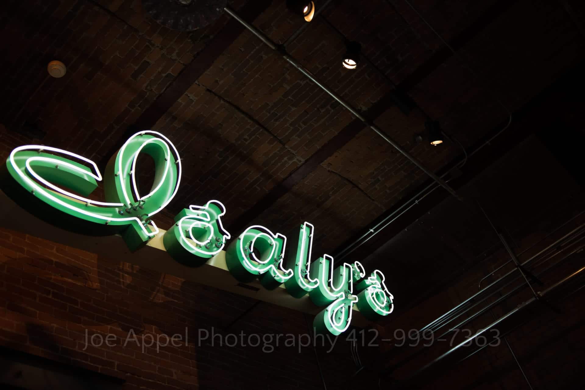 Green neon Isaly's sign in the Great Hall at the Heinz History Center