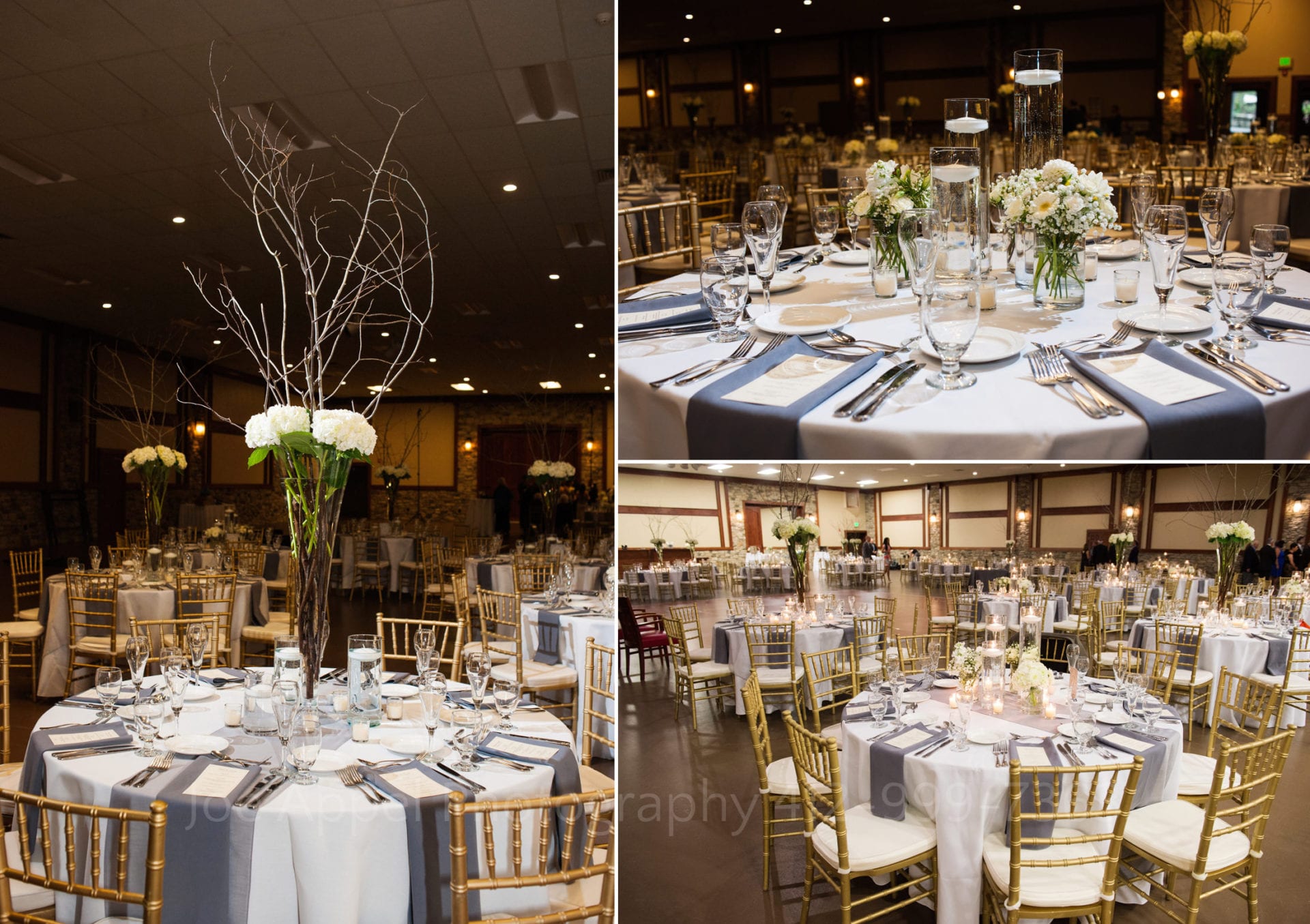 centerpieces with white branches and flowers sit on white tables with gray napkins Seven Springs Weddings