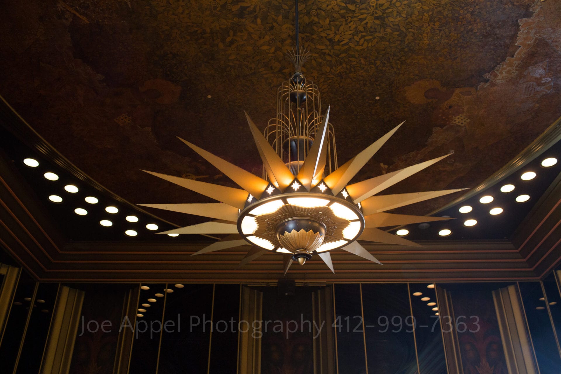 a gold and bronze spiked chandelier