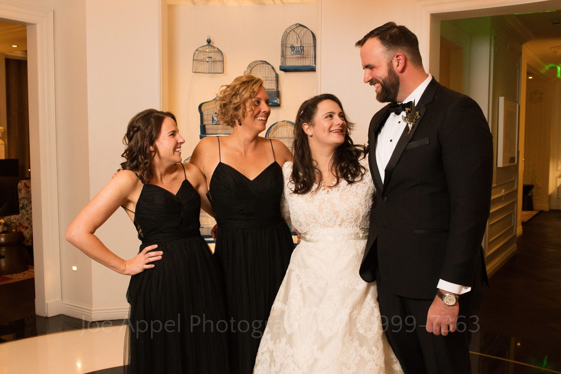 a bride poses with her family at the hotel monaco pittsburgh wedding