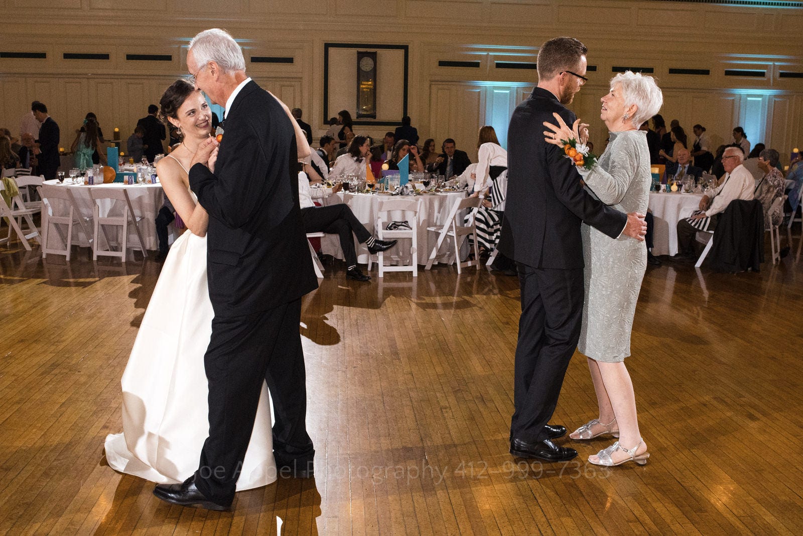 A bride dances with her father and a groom with his mother during Soldiers and Sailors Wedding Photos.