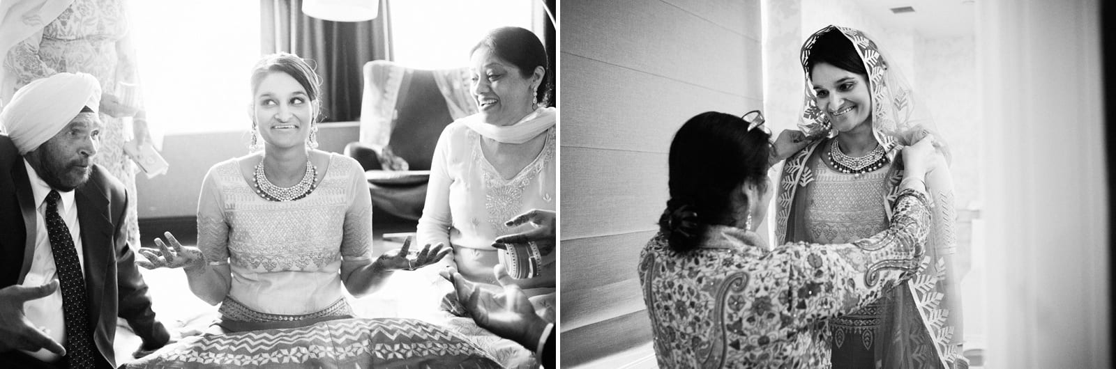 A bride wearing a sari gets ready for her Renaissance Phipps South Asian Wedding.