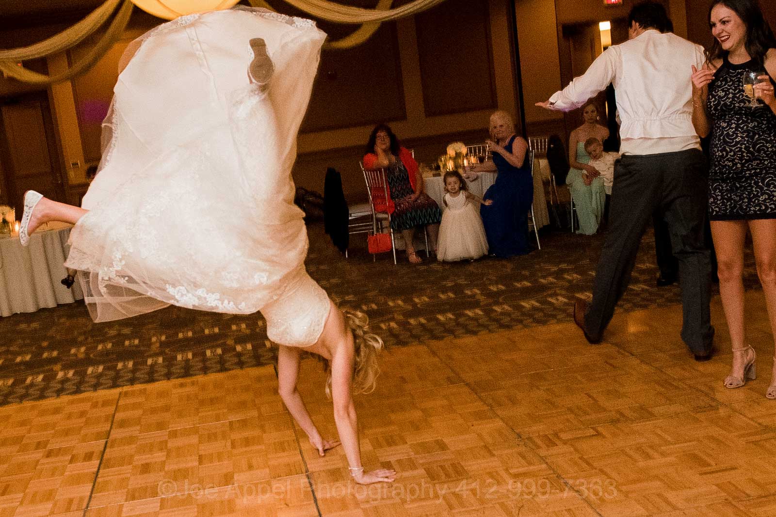 A bride dies a somersault on the dance floor at her Embassy Suites Pittsburgh wedding.