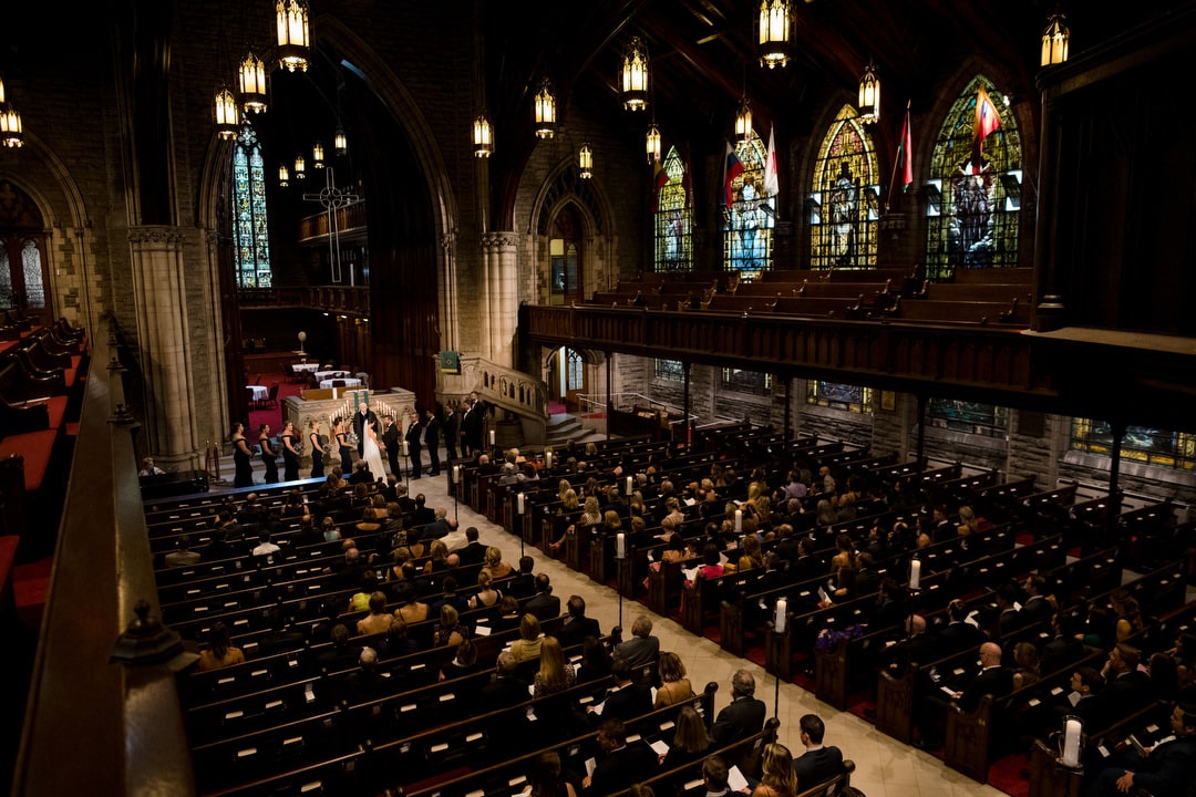 A photo of the congregation gathered for a wedding at the First Presbyterian Church in Pittsburgh.