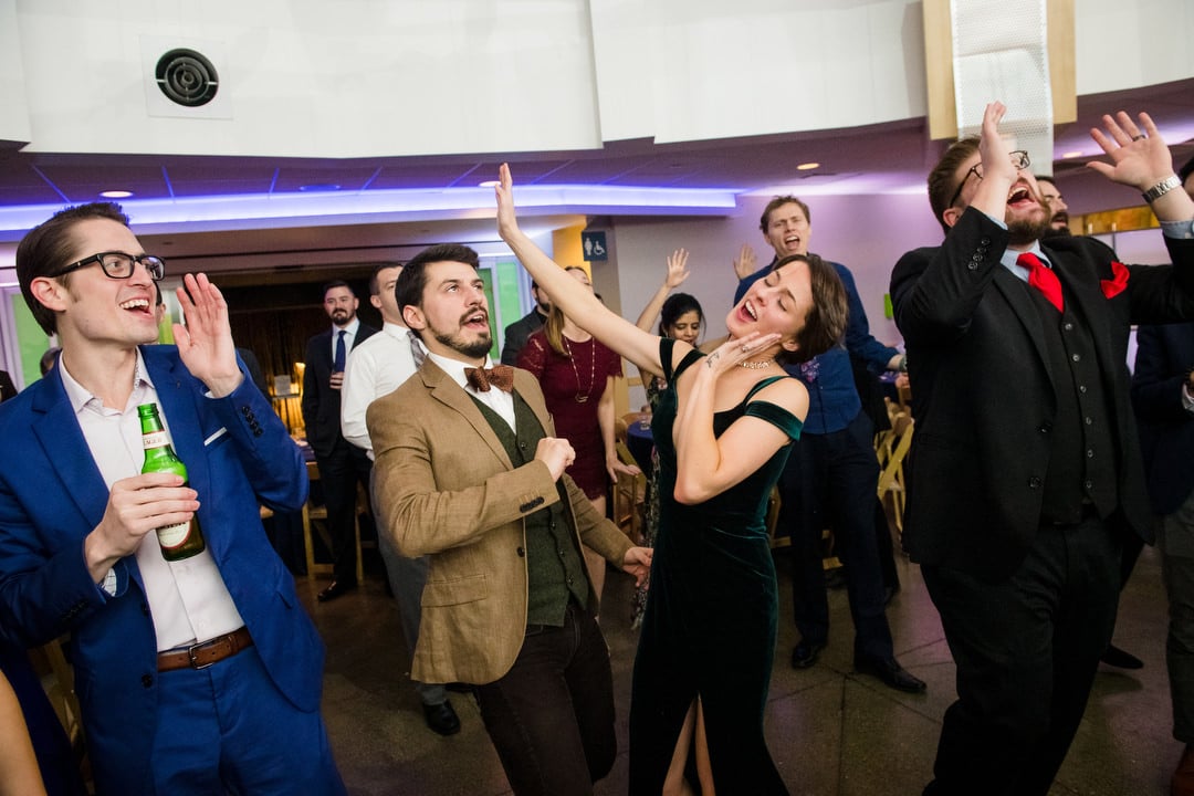 Couples dance during a wedding at the Pittsburgh Aviary.