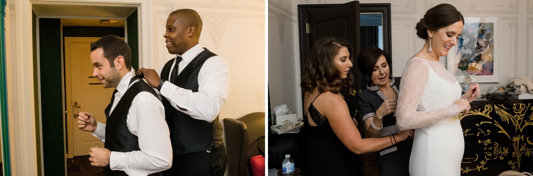 A groom helps his friend with his shirt collar while bridesmaids help the bride put on her wedding dress.
