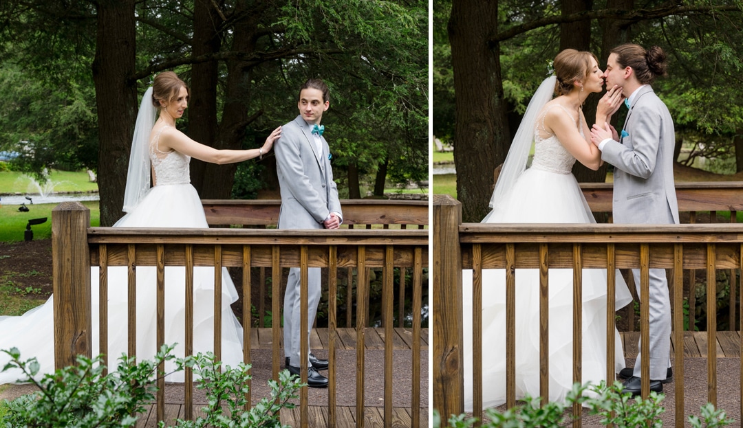 A first look on a small bridge over a creek during a summer wedding at seven springs
