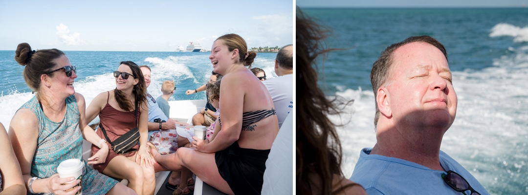 A man suns his face while riding on a boat. Young women laugh while riding on a boat.