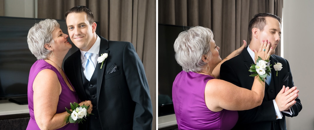 The mother of a groom wearing a chartreuse dress and a wrist corsage kisses her son on the cheek then wipes the lipstick she left on it. This is in a room at the Renaissance Hotel in Pittsburgh.