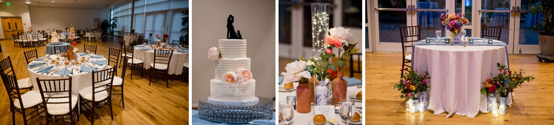 A banquet hall set for a formal event with round tables, blue napkins, a tiered white cake with floral decorations, elegant floral centerpieces, and a sweetheart table adorned with flowers and twinkling lights.